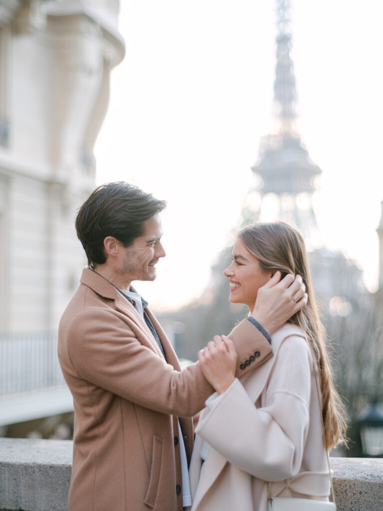 Parisian Engagement Session at Trocadéro - A winter wonderland of love and sophistication in the city of Paris. Capturing the joy and excitement of the couple with stunning views of the Eiffel Tower