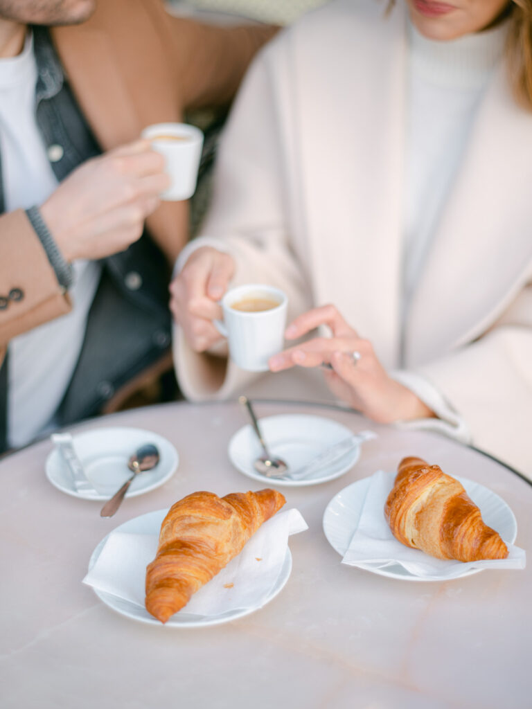 Parisian cafe romance during engagement session