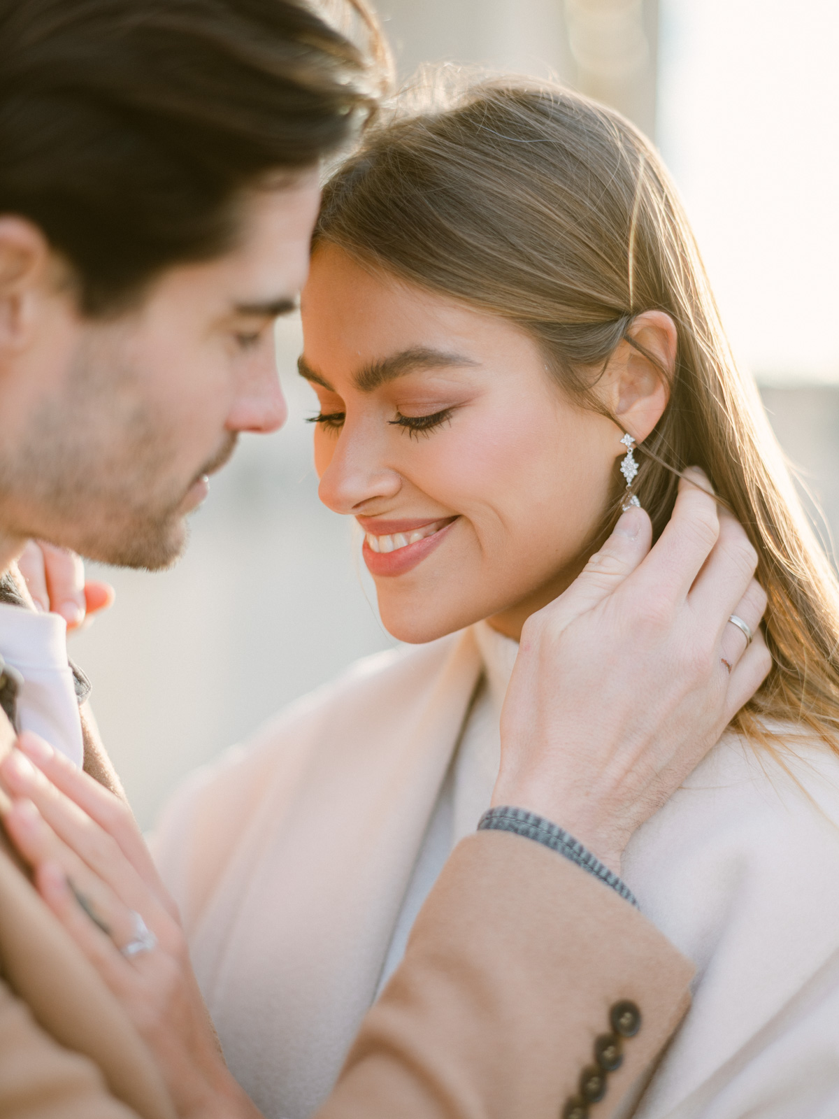 Romantic embrace during Paris engagement
