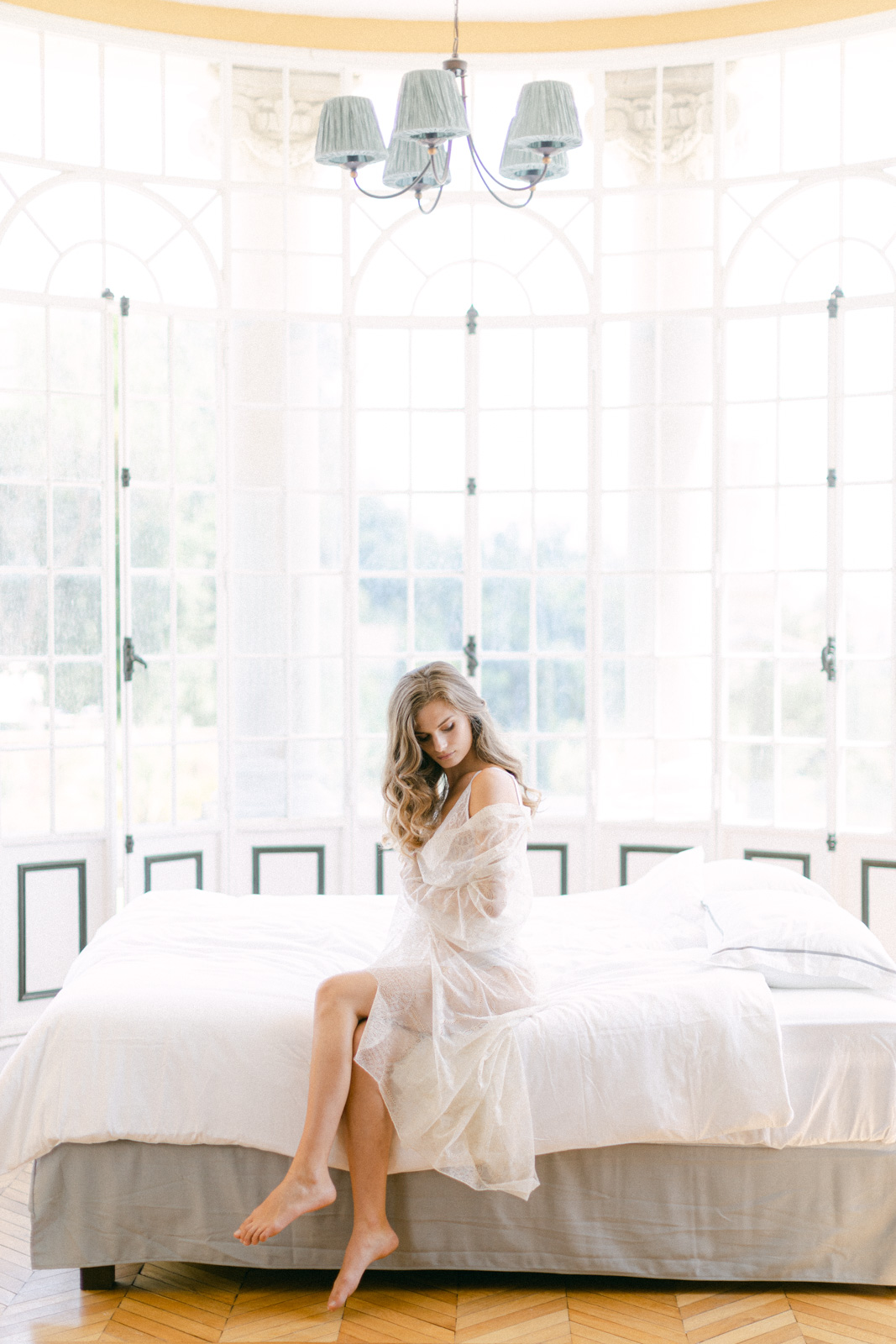 An intimate boudoir shot of the bride, taken before the Chateau Mader wedding