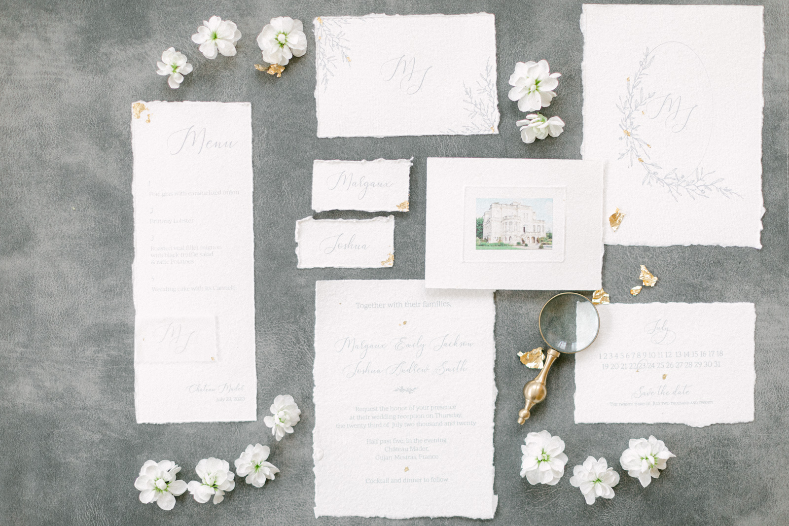 Chateau Mader wedding invitation flatlay with elegant details