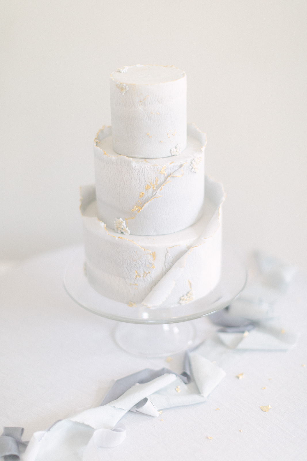 Chateau Mader wedding cake adorned with elegant details