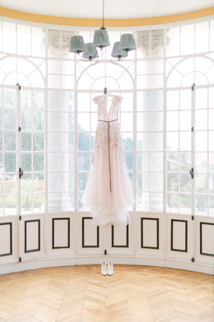 A close-up of the bride's exquisite Made Bride gown details during her Chateau Mader wedding