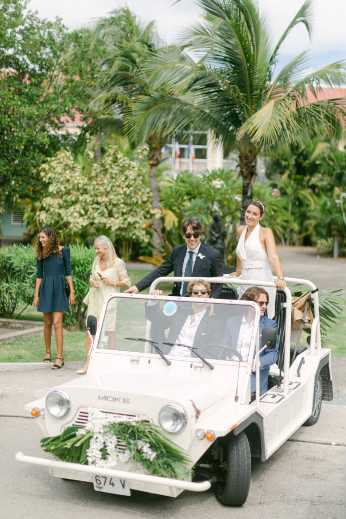 St Barts Beach Wedding couple outside Gustavia Town Hall with Moke car
