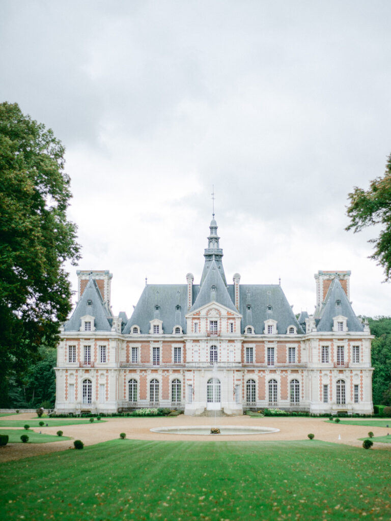 Château de Baronville stands regally, its grandeur and refined gardens painting the perfect picture for a luxury wedding near Paris