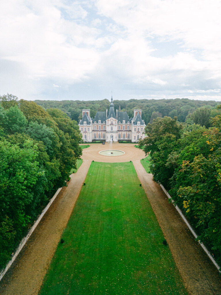 From above, Château de Baronville presents an enchanting layout, a quintessential example of luxury wedding châteaux near Paris
