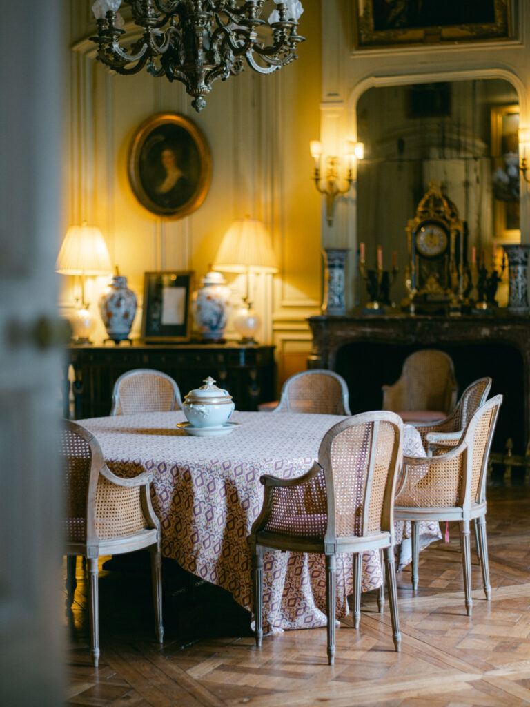 Inside Château de Champlatreux, the ornate halls whisper tales of bygone elegance, perfect for a luxurious wedding reception near Paris