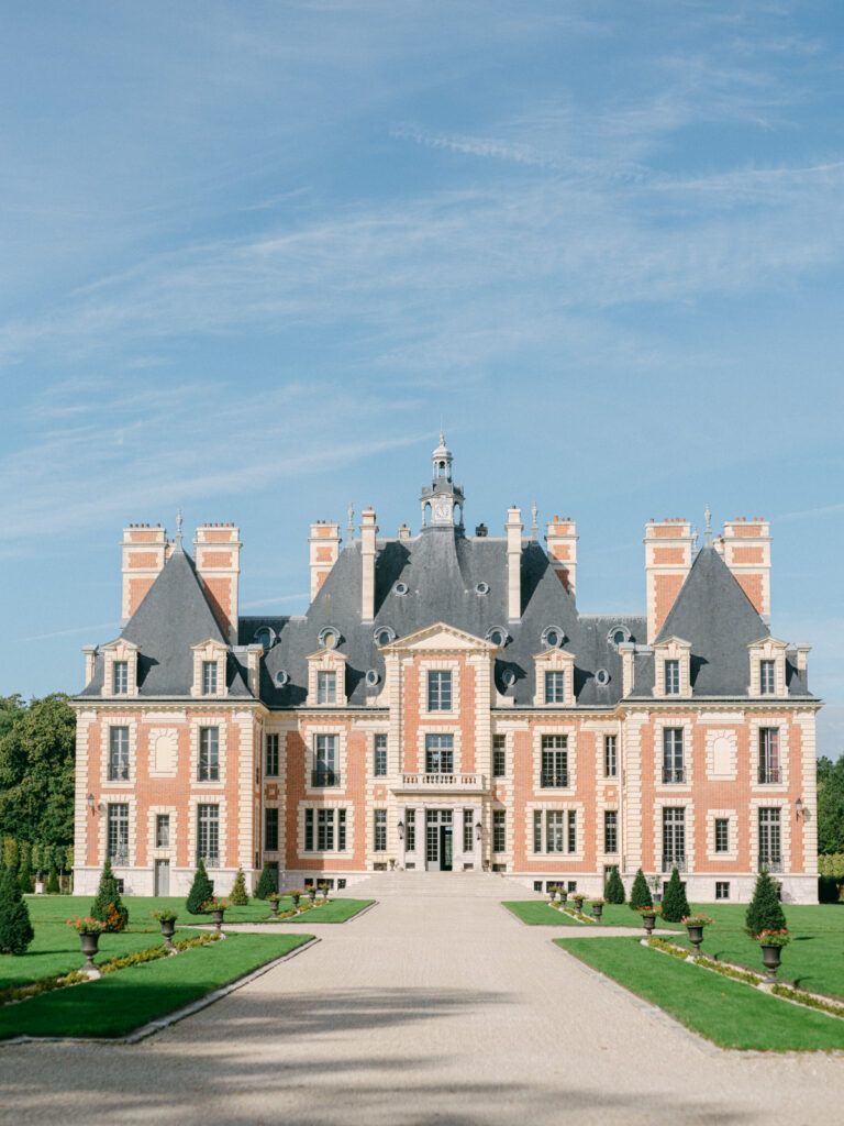 The charming exterior of Château de Nainville les Roches provides a quaint and luxurious setting for weddings near Paris