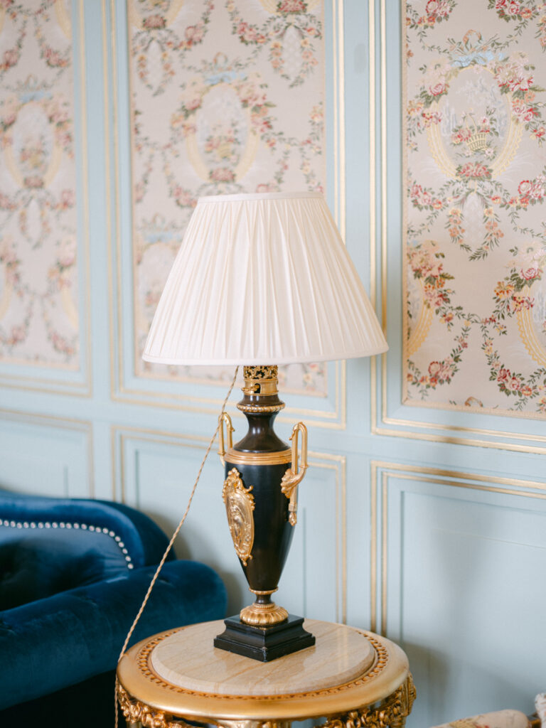 Art-adorned walls and elegant spaces within Château de St Martin du Tertre offer a unique and luxurious wedding experience near Paris