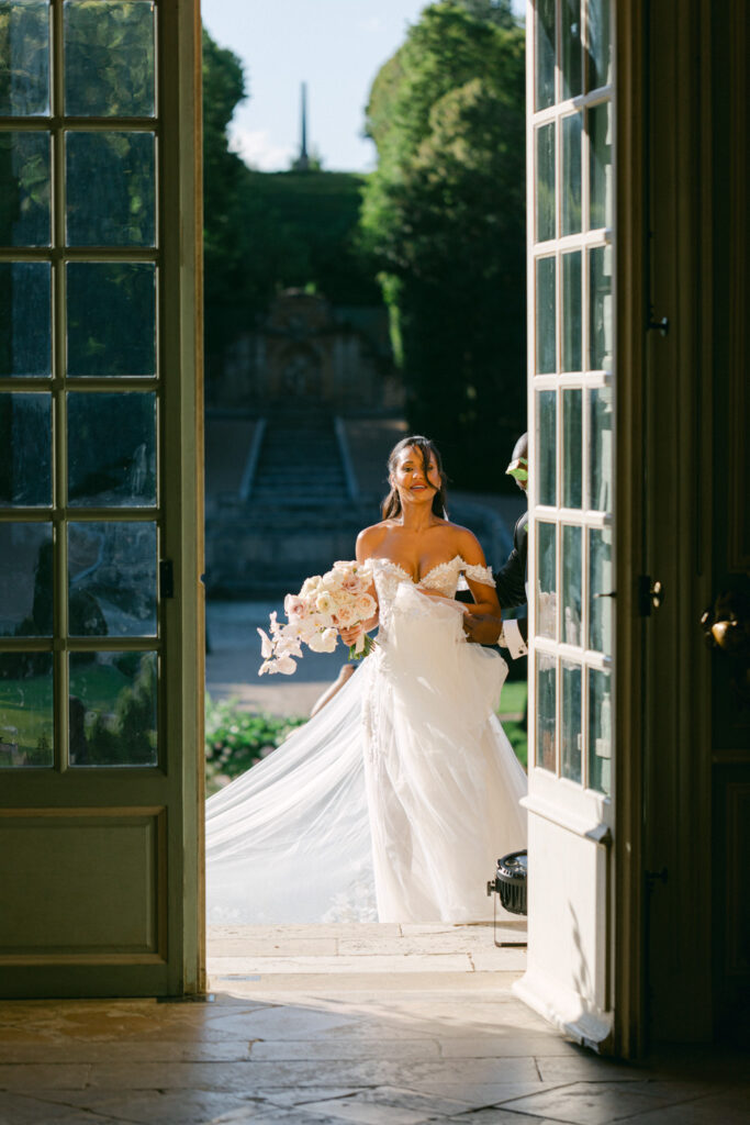 As the narrative of 'Chateau de Villette: An Elegant Parisian Wedding' unfolds, the ceremony at Chateau de Villette blends love, elegance, and Parisian charm