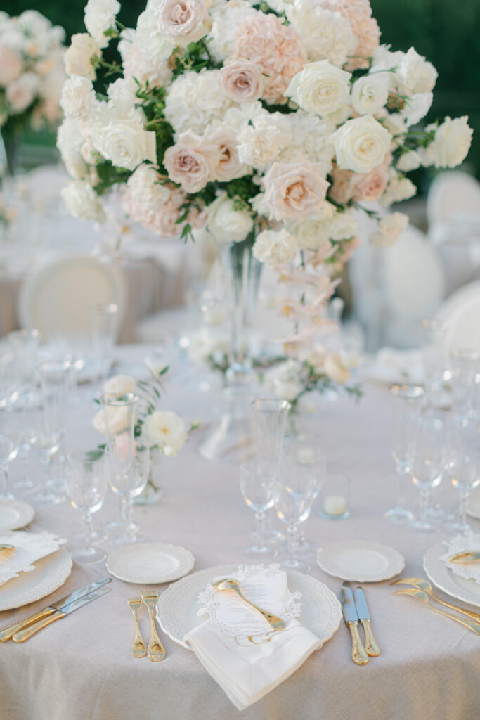 Each table at Chateau de Villette is adorned with elegance, reflecting the grandeur of 'Chateau de Villette: An Elegant Parisian Wedding,' blending classic French charm with modern finesse