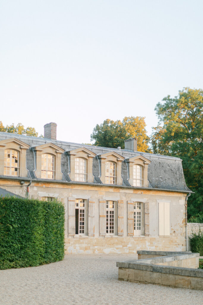From the serene elegance of Chateau de Villette, one can gaze upon the lush French countryside, setting a majestic scene for 'An Elegant Parisian Wedding