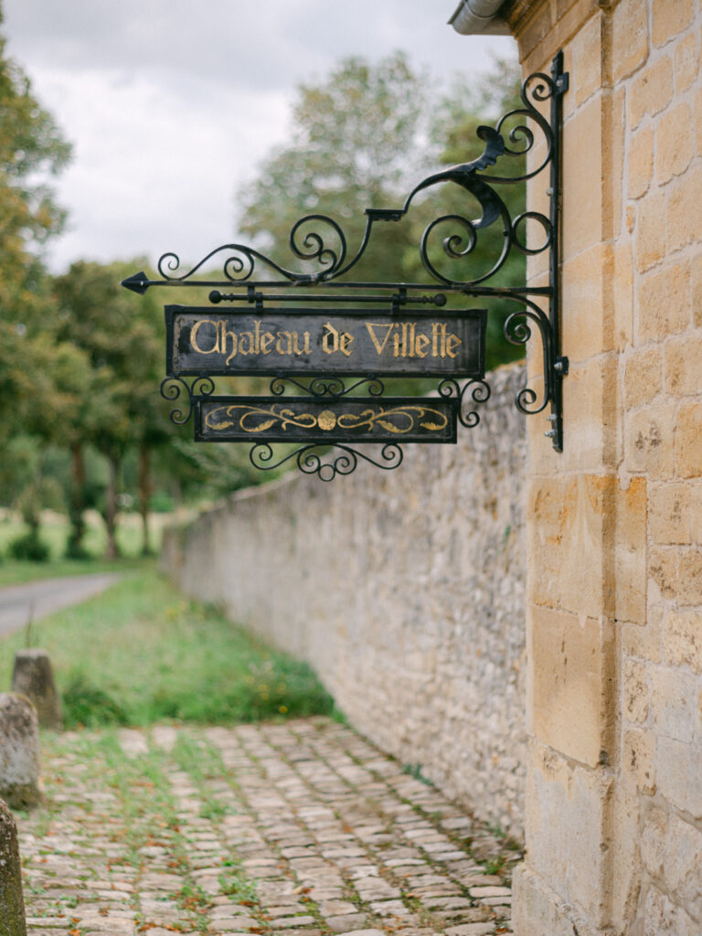 The opulent exterior of Château de Villette, reminiscent of Versailles, sets the stage for an unforgettable luxury wedding near Paris