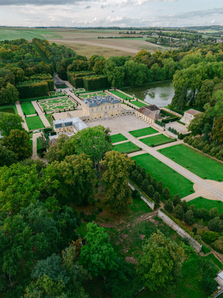 Château de Villette, captured from the sky, illustrates the grandeur and symmetry of luxury wedding châteaux near Paris