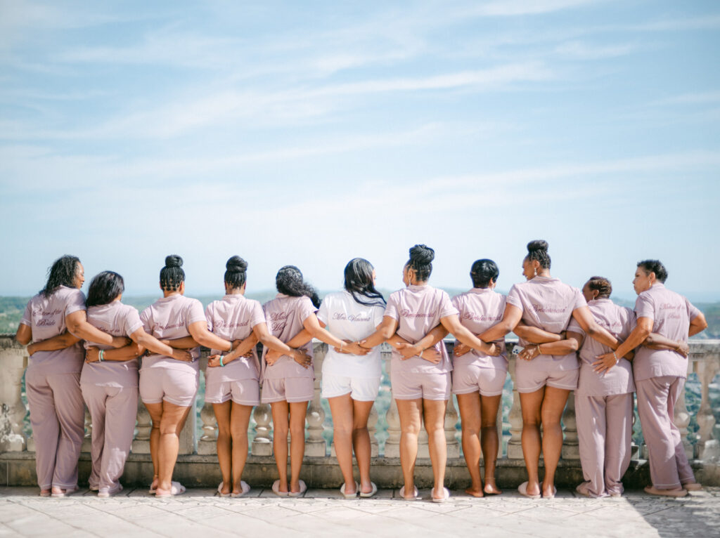 The bride's first reveal to her bridal party captures heartfelt reactions, a memorable moment of emotion and beauty at the French-Riviera-St-Georges-Wedding
