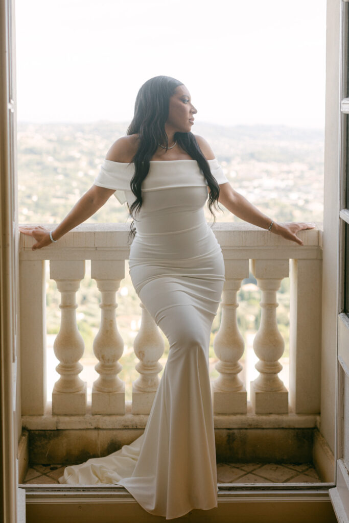 In a room filled with natural light, the bride's hair and makeup are crafted to perfection, reflecting the elegance of a French-Riviera-St-Georges-Wedding