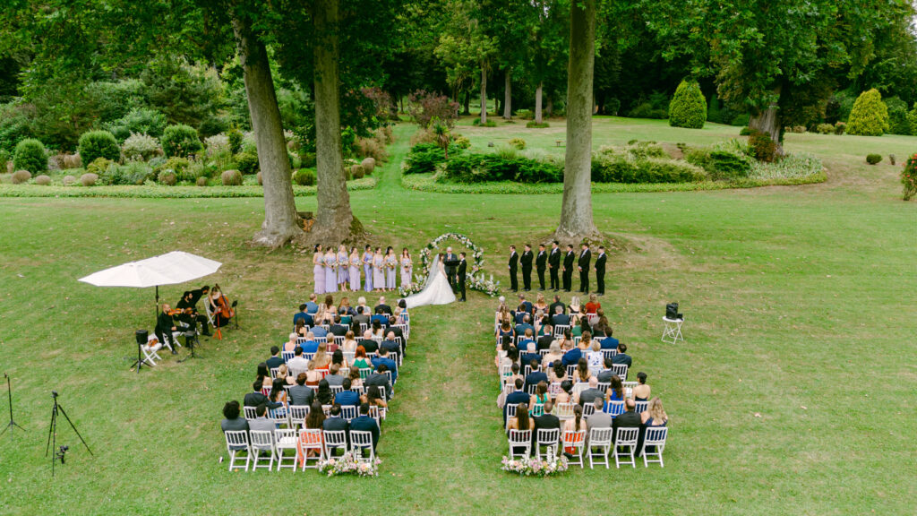 A garden ceremony framed by florals and emotion, at one of the most beautiful places for a Château d’Aveny wedding near Paris.