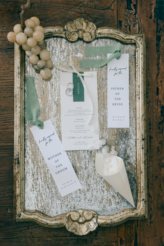 luxury wedding stationery flatlay with vineyard touches