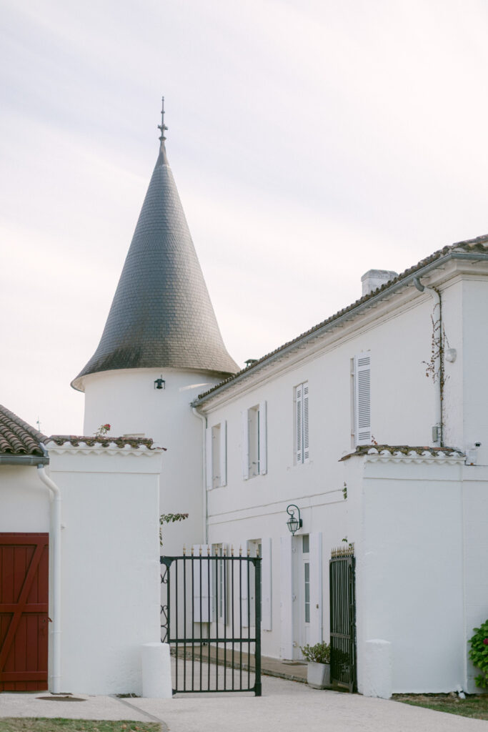 Historic façade of Château de Seguin with French architecture and gardens