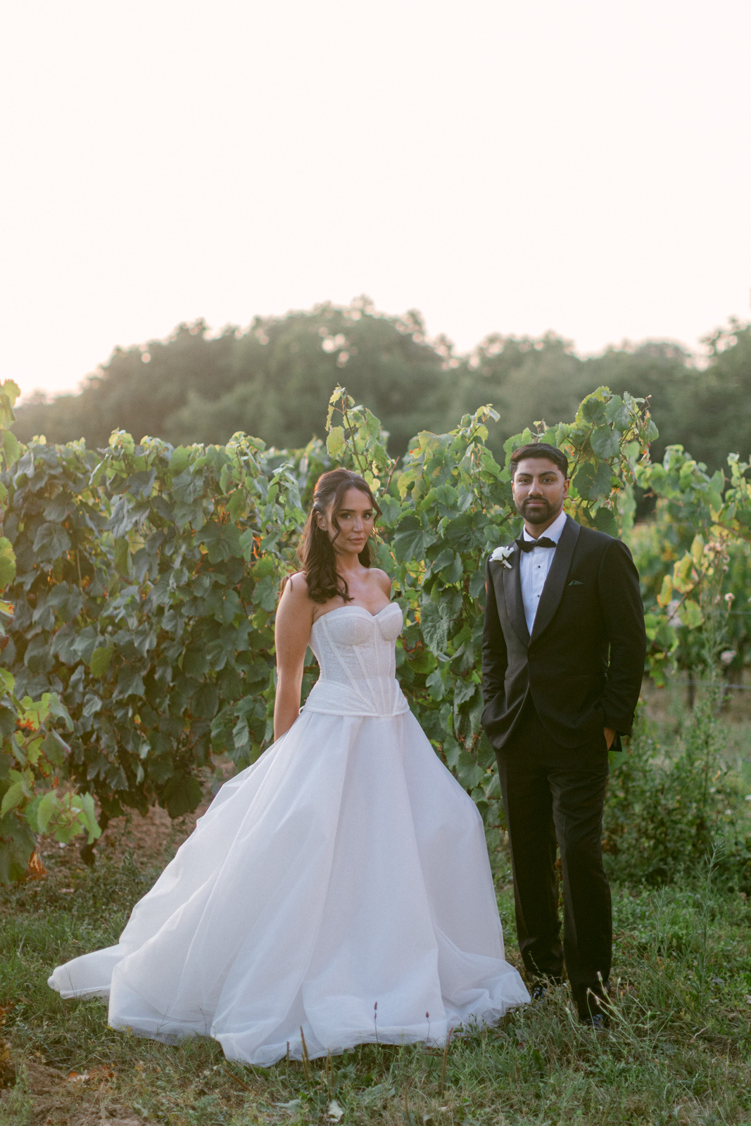 Bride and groom portraits in the vineyards at Château de Seguin wedding