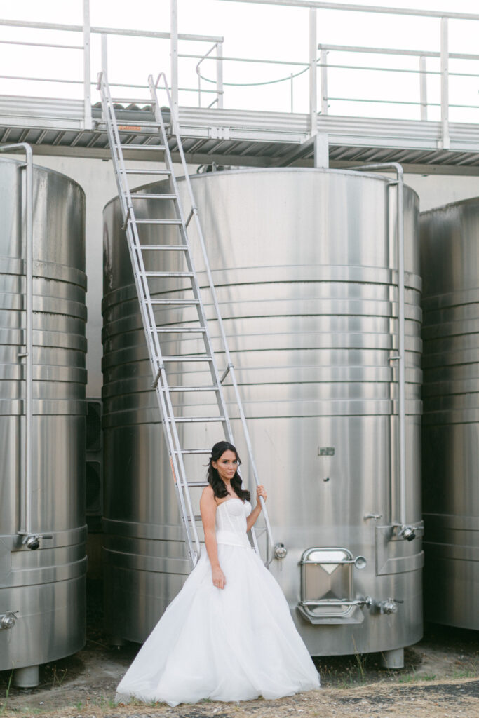 editorial portrait of bride by French chateau facade