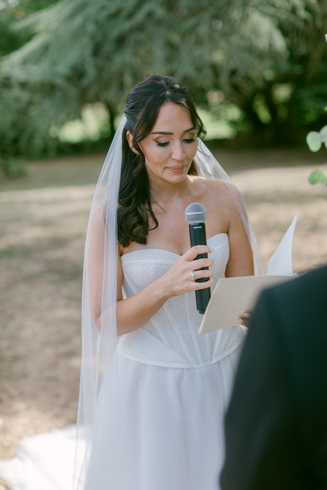 Bride and groom exchanging vows during a Château de Seguin wedding in Bordeaux