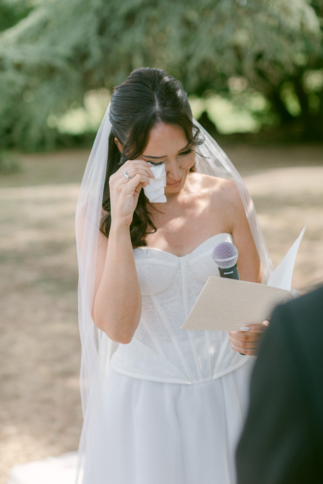 Bride and groom exchanging vows during a Château de Seguin wedding in Bordeaux