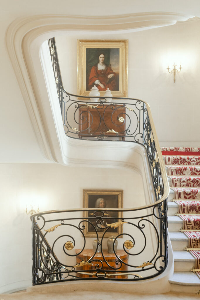 Classic grand staircase at Hôtel Plaza Athénée Paris, timeless backdrop for weddings
