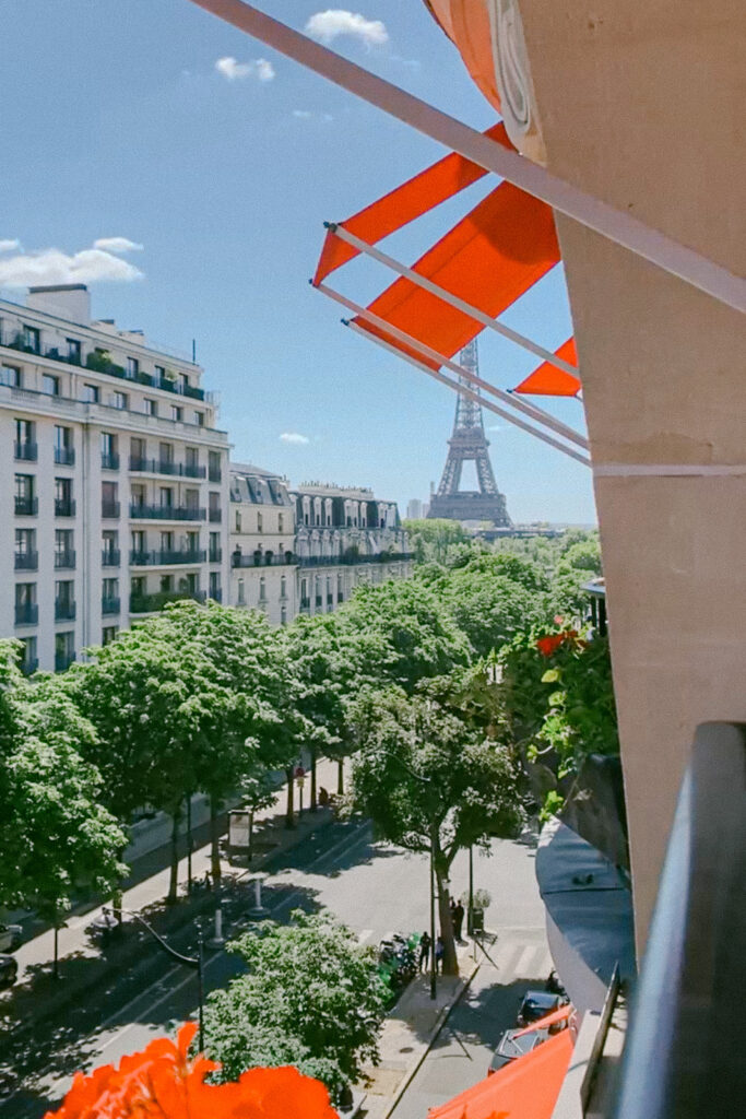 View of the Eiffel Tower from a balcony at Plaza Athénée Paris, luxury wedding venue