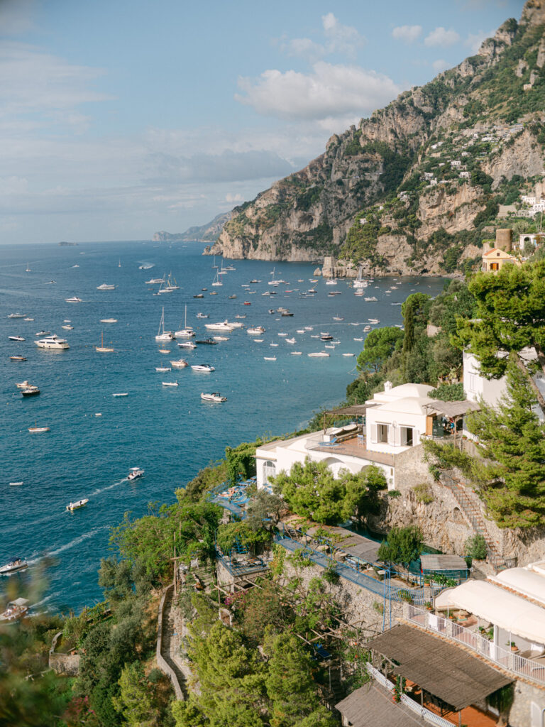Positano engagement session on Amalfi Coast with sea view and pastel houses